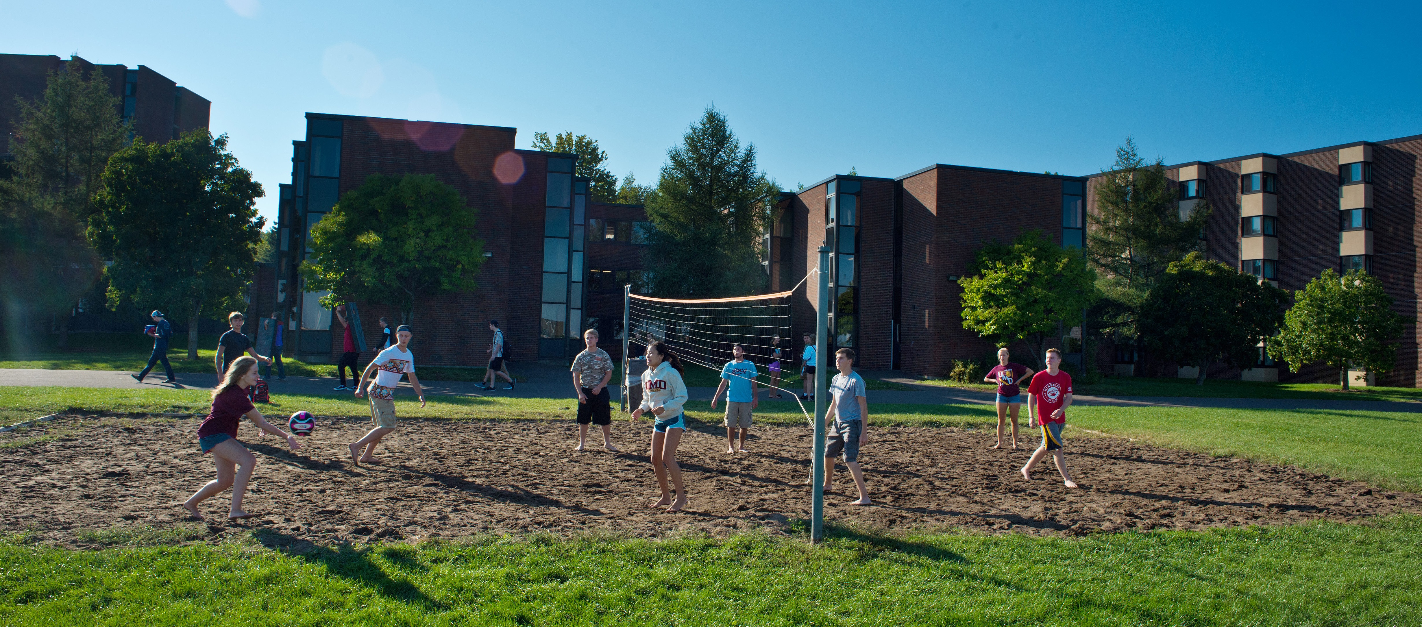 Students playing volleyball on Griggs Beach